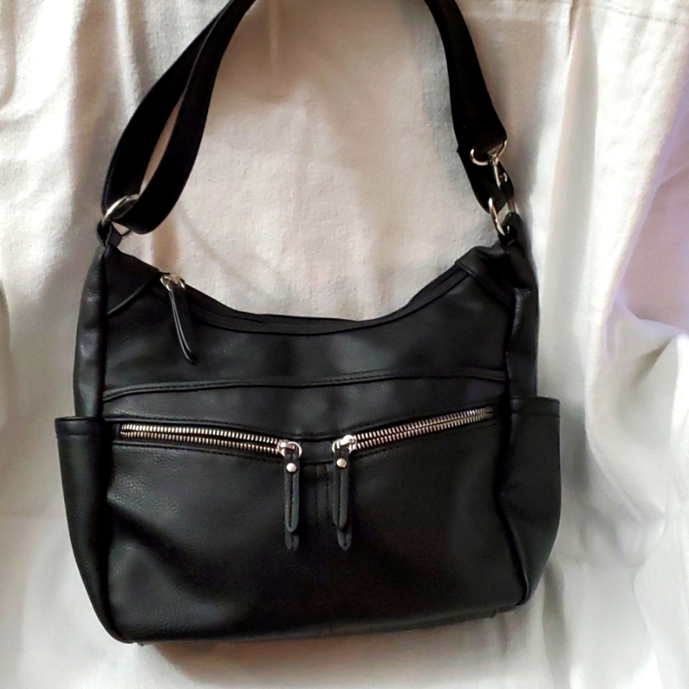 Black non leather purse adjustable shoulder strap, two pocket in the middle